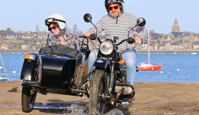 Saint Malo and Saint Servan in vintage sidecar with driver